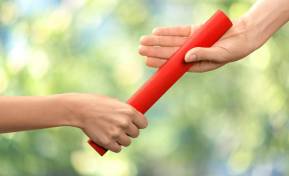 Teaching young athletes how to pass the relay baton